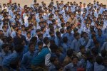 jhalawar Me in the middle of some students at the public school wide assembly.