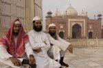 agra Muslim men in front of the mosque at the Taj Mahal, Agra.