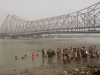 The truly devout bathing beneath the Howrah Bridge in the less than pristine yet holy waters of the Hooghly River, Calcutta.