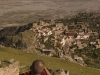 Monk on the high kora route overlooking Ganden Monastery.