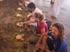 Robin, Sarah, and Deepak eating the Temple meal at Shri Shri Narsinga Mandir, Imphal