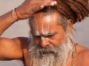 Sadhu decorating his forehead, Kumbh Mela, Haridwar