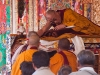 Receiving blessing from the Dalai Lama