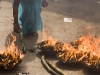Burning offerings at Kumbeshwar Temple, Patan.