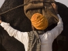 Attaching a saddle, a.k.a. blanket, to a camel, Pushkar.