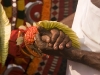 Theyyam artist preparing to become possessed by the deity, Kannur District.