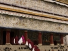 Monks entering in the main prayer hall with offertory scarves at Labrang monastery, Xiahe.